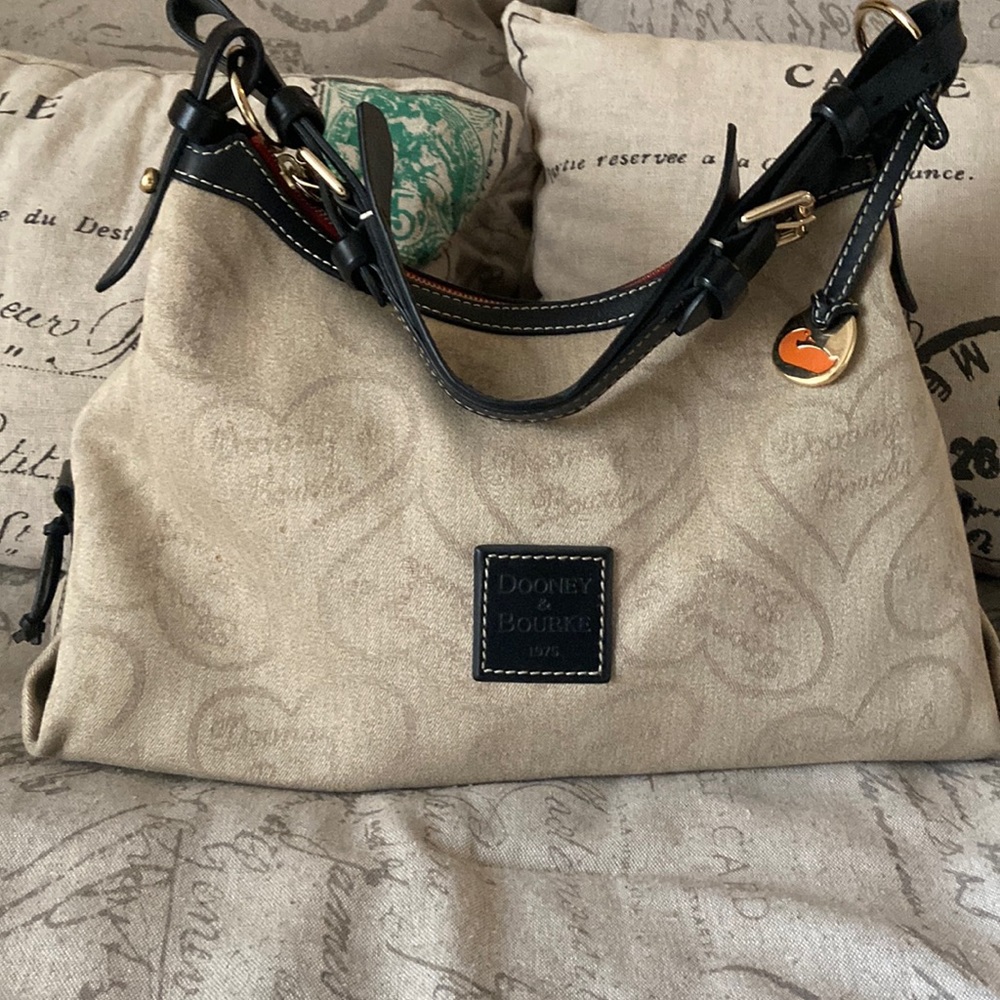 Dooney & Burke 1975 Tan Canvas Slouch type purse